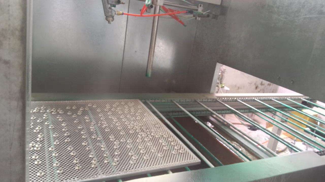 單軸機噴金屬紐扣產品案例